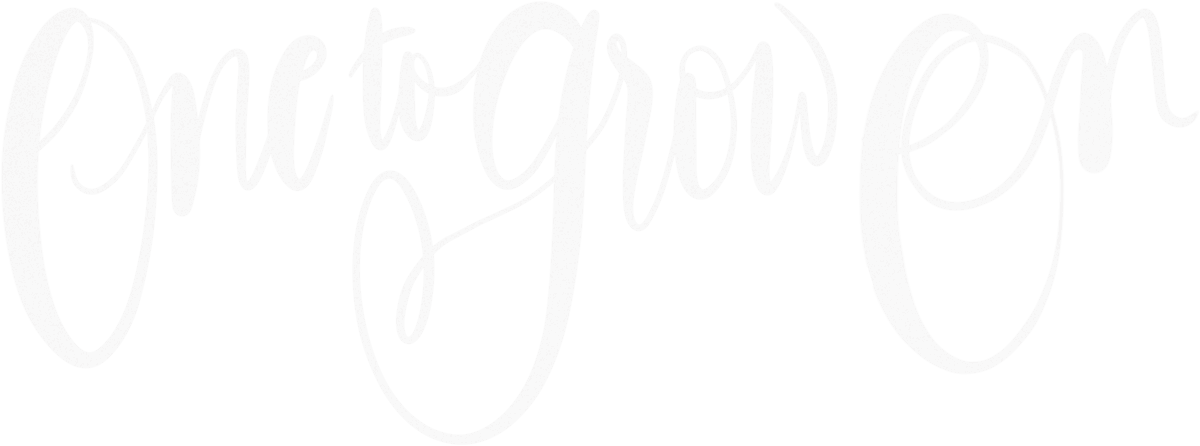 Cursive text that says One to Grow On
